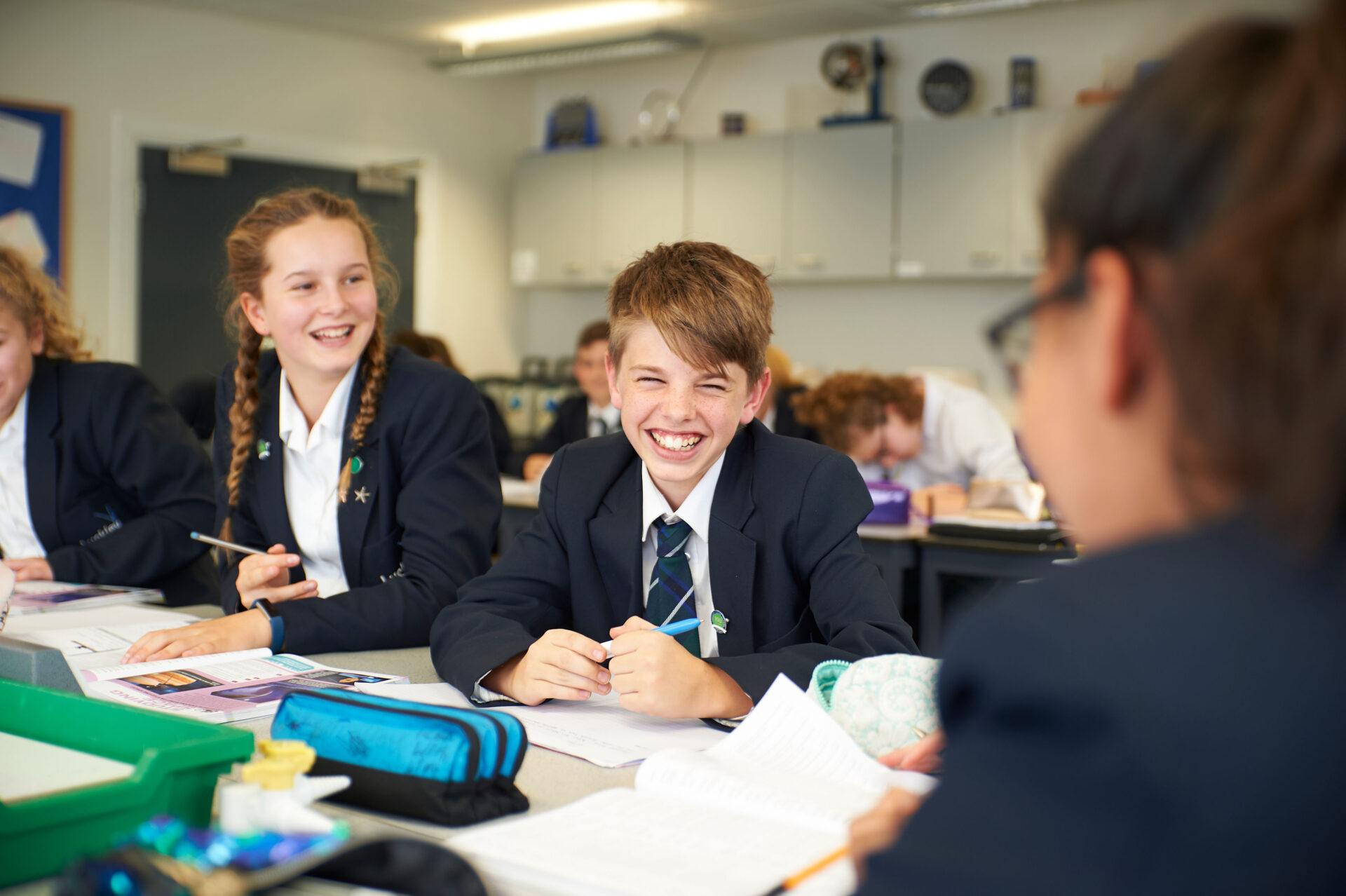 students laughing in the classroom