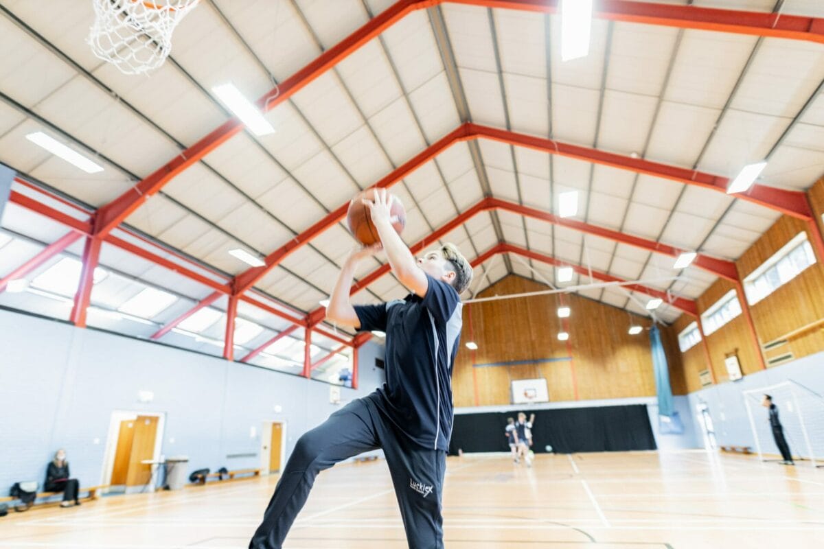 child playing basketball